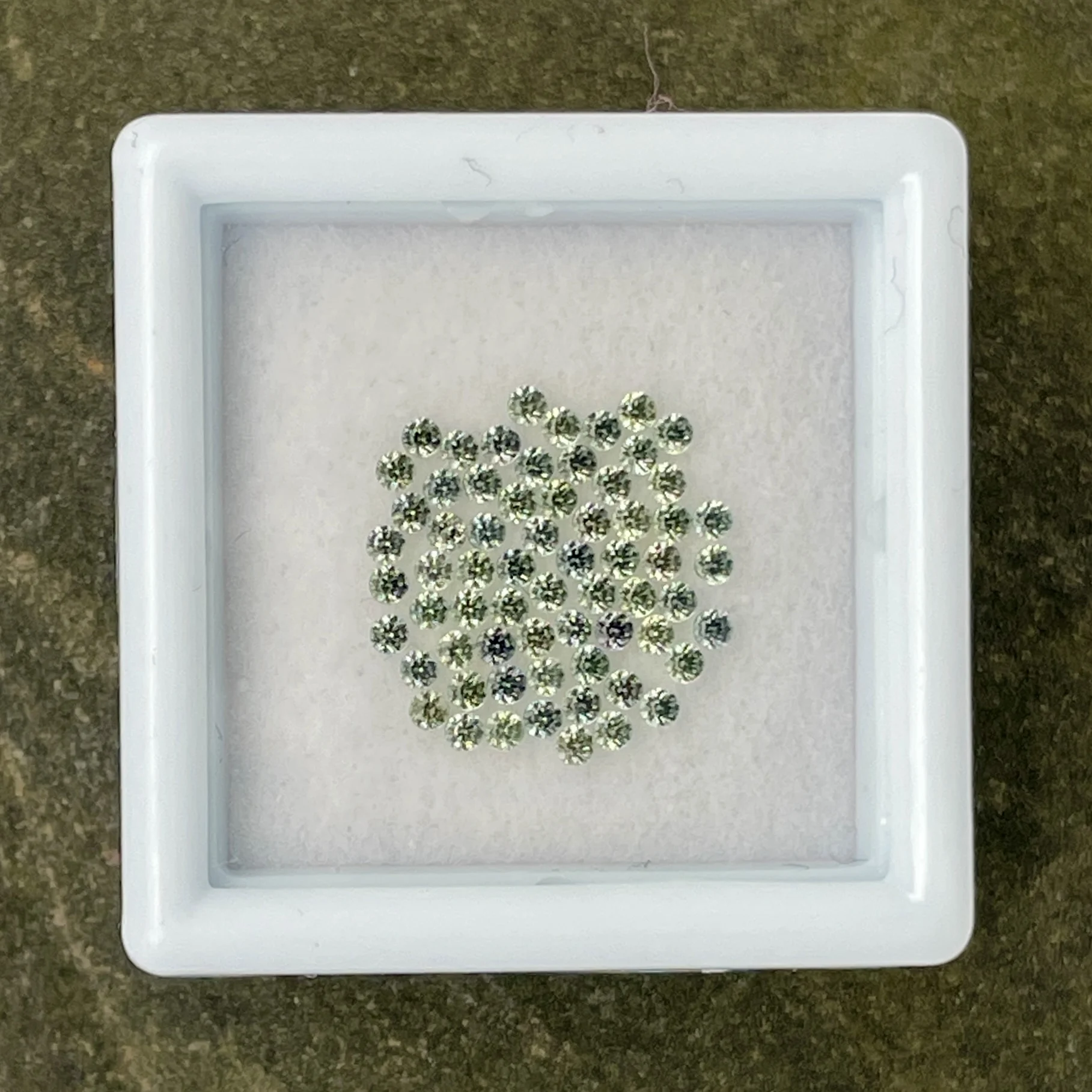 SGC005P1 Sapphire Parcel (65 pcs) | 1.40 mm Precision-Cut Brilliant | Bluish Green | Songea, Tanzania | No Heat - Image 1
