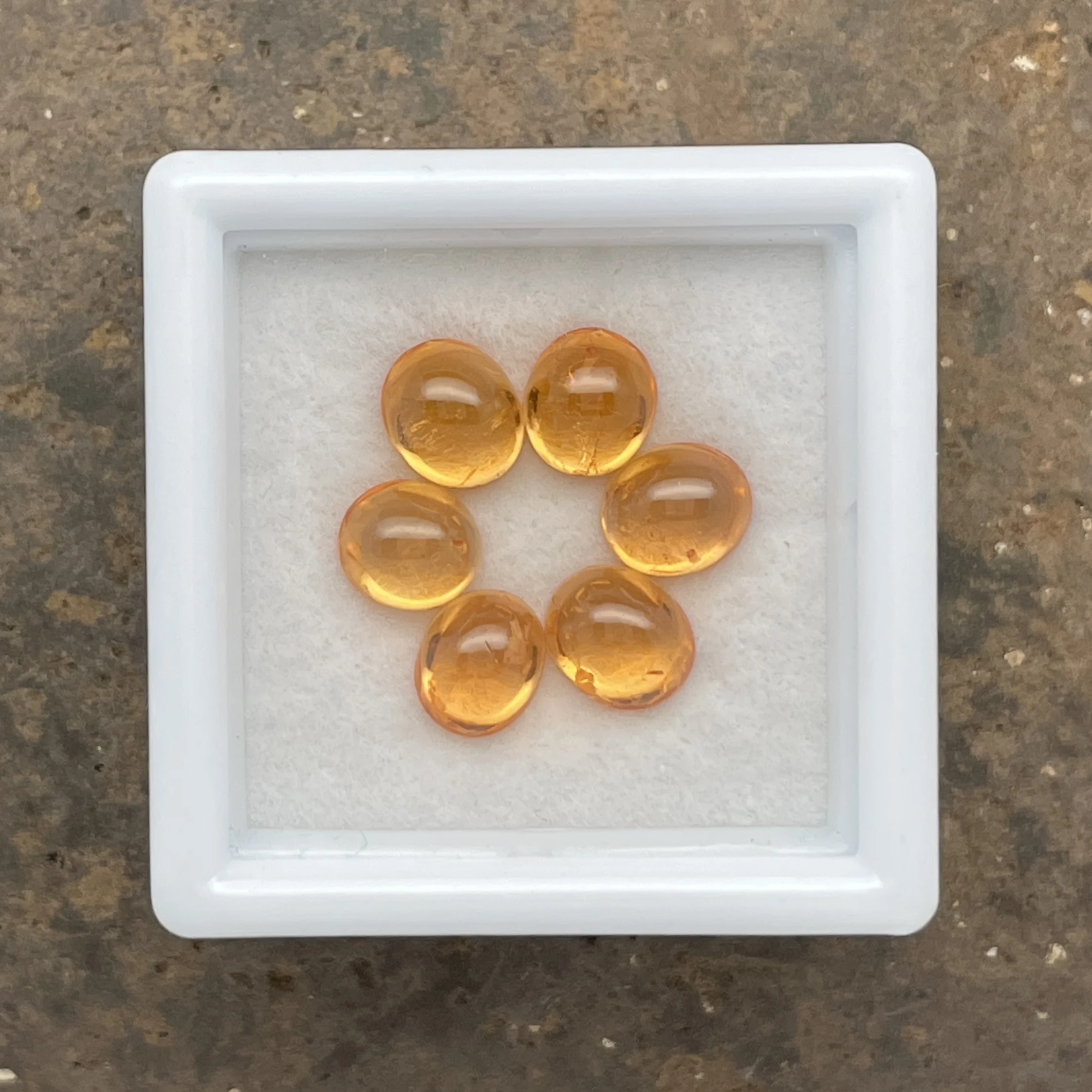 MGA019P1 Mandarin Garnet Parcel 6.80 ct | Oval Cabochon | Fanta Orange | Iseyin, Nigeria - Image 1