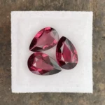 Umbalite (Rhodolite Garnet) Layout 7.61 ct | Pear Shape | Violet Red | Umba Valley, Tanzania
